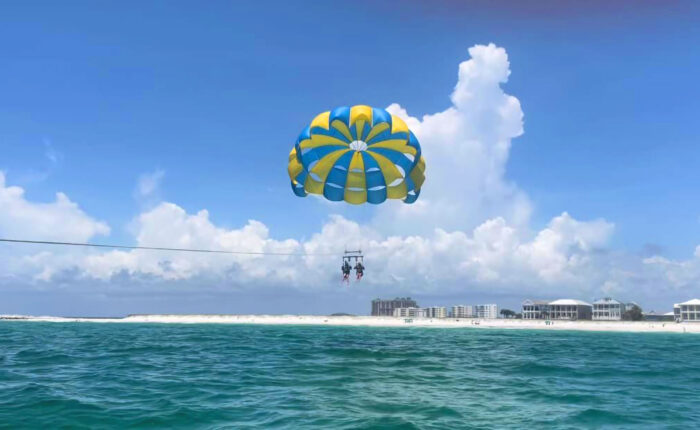 parasailing over beautiful blue water